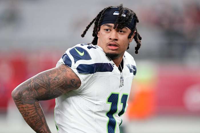 Seattle Seahawks wide receiver Jaxon Smith-Njigba (11) warms up prior to facing the Arizona Cardinals at State Farm Stadium.